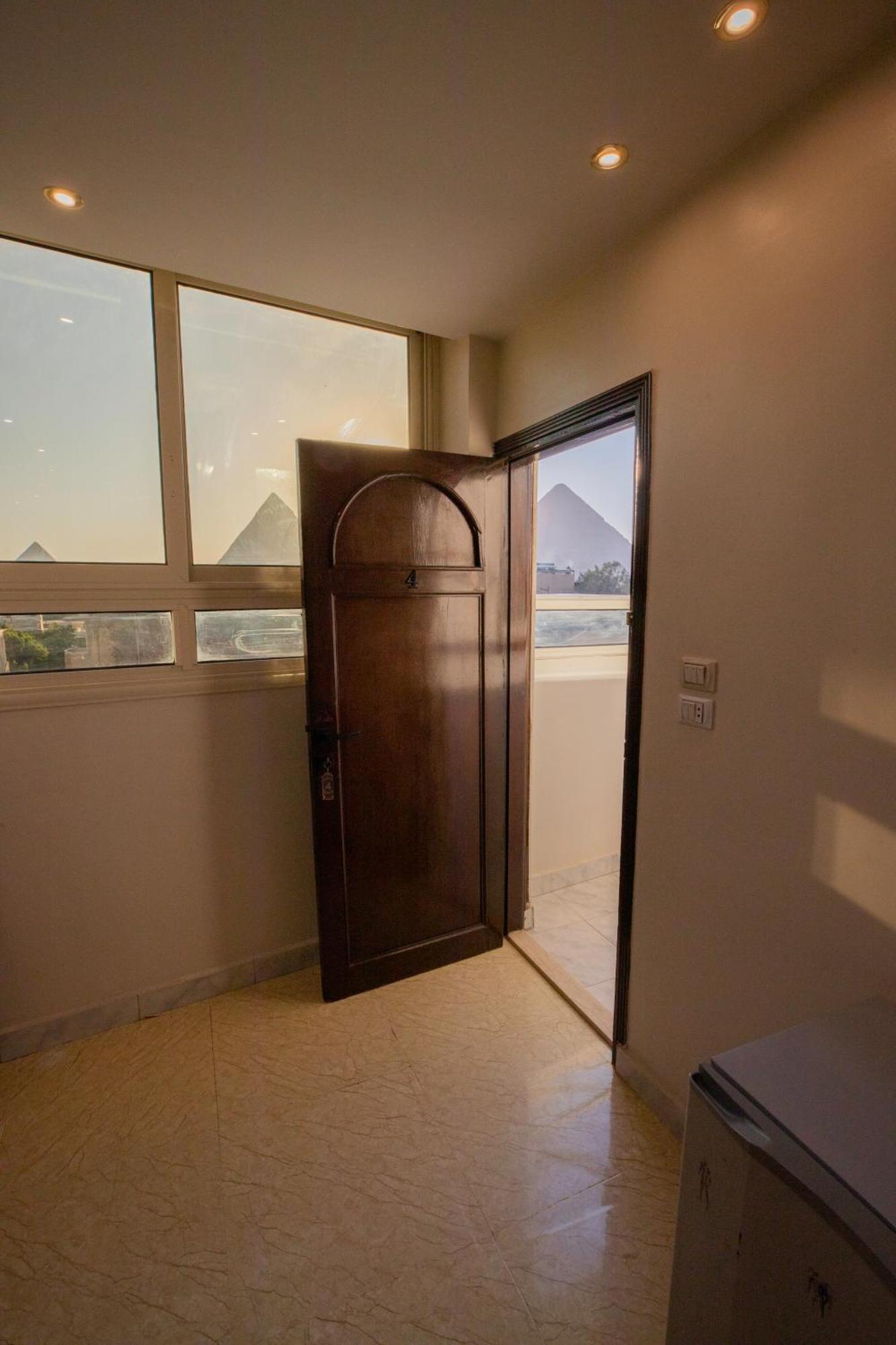 Horus Guest House Pyramids Kafrat al Jabal ภายนอก รูปภาพ